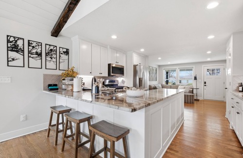 Lee's Summit House | Welcome to your luxury Lee’s Summit getaway—a high-end 4-bedroom, 3-bath home designed for comfortable group stays with a true “vacation mode” backyard. Each bedroom has its own Roku TV, ready for you to log in with your credentials.