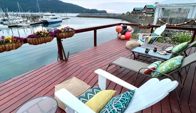 2 night minimum on Waterfront Suite with private deck at boat harbor entrance