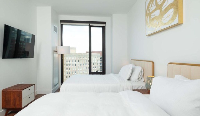 Back-Bay Lux Central 2BR Condo with Rooftop and Parking