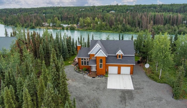 Beautiful 4 Bedroom Home secluded on the Kenai River with improved road access