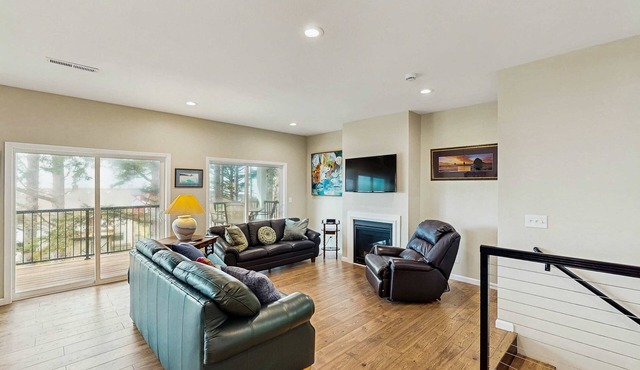 Charming home with ocean views, patio, BBQ grill, WiFi, W&D, walk to beach