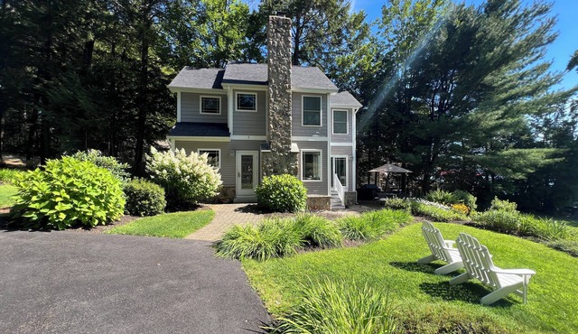 Charming Lakefront 2-Bedroom Home with Sandy Beach and Stunning Views