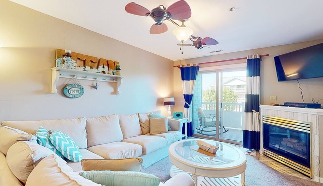 Enchanting condo with pool, fireplace, central AC, & washer/dryer