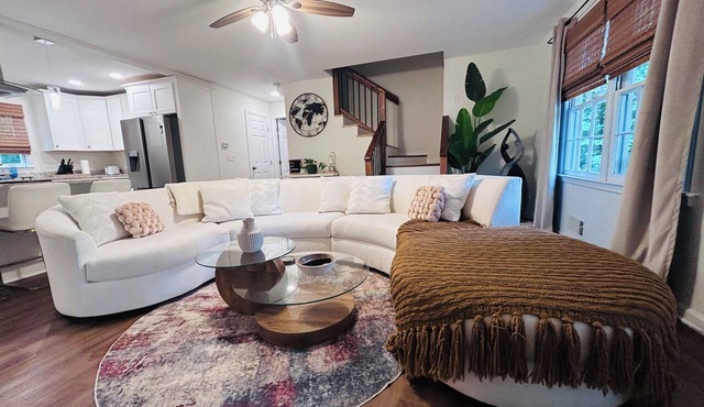 Spacious 5-bedroom, 2 kitchens, 2 master bedrooms with a finished basement.