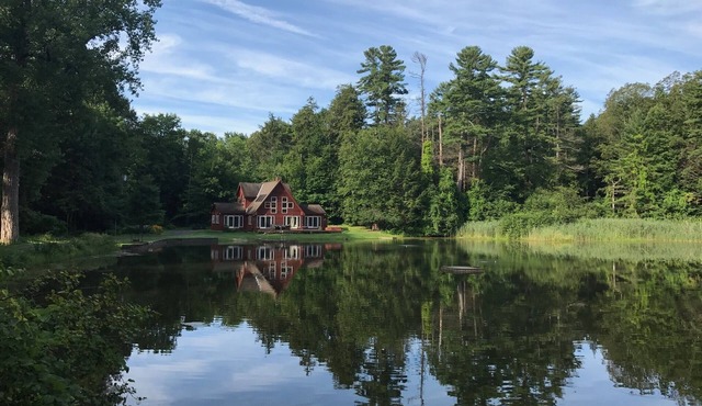 Spectacular setting on your own private lake close to it all! in Lee