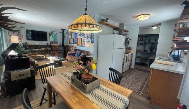 The Alaska Cottage pays homage to SE Alaska as a destination for over 100 years