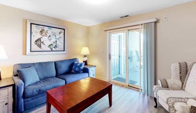 Updated Bayfront Condo w/ Canal Views, Balconies, Shared Pools - Walk to Beach