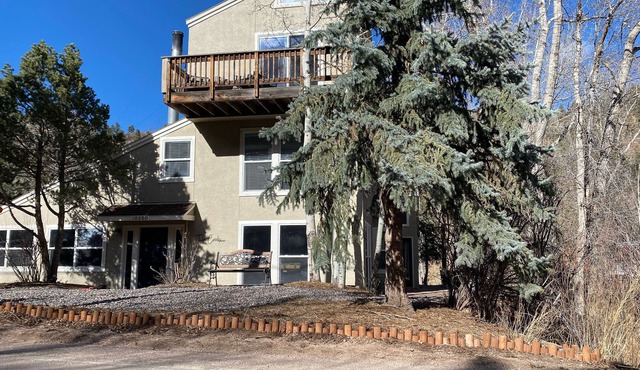Updated creekside cabin with WiFi, hot tub, & fireplace - near lake and town