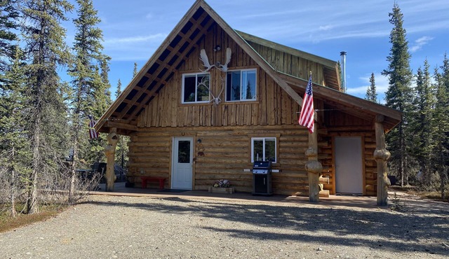 Log House on Denali Airstrip at Mile Post 229.5 of the Parks Highway.