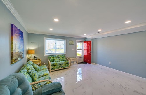 Caine Woods Apartment | Deck w/Canal Access: Ocean City Townhome