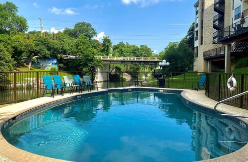 New Braunfels Condo | River City Resorts: INV 115: Free Tubes, On Comal, Walk to Schlitterbahn