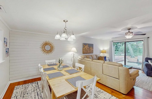 Folly Field Apartment | Dog Friendly Condo with Fast WiFi, a Patio, & Shared Pool Walk to the Beach