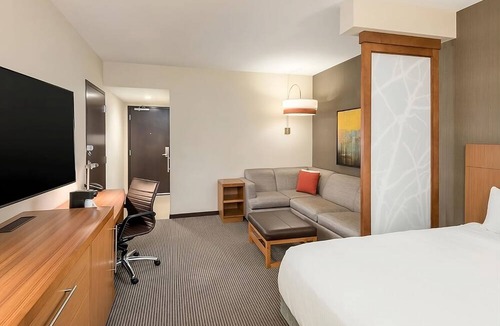 Greenville Downtown Apartment | King Comfort x2: Free WiFi, Indoor Pool, Steps from Bon Secours Arena