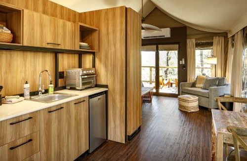 Zirconia House | Secluded Glamping Tree Tent with Outdoor Soaking Tub & Private Pizza Oven Near Waterfalls, Zirconia, NC