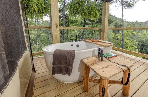 Zirconia House | Secluded Glamping Tree Tent with Outdoor Soaking Tub & Private Pizza Oven Near Waterfalls, Zirconia, NC