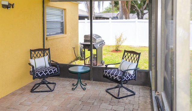 Lanai & Pond at Tranquil Bradenton Retreat!