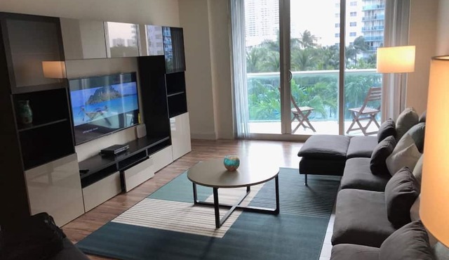 F- Beautiful view of pool and gardens! Walk to beach!