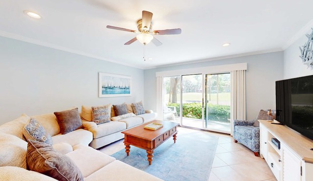 Golf-course view condo with central AC, free WiFi & shared pool - walk to beach